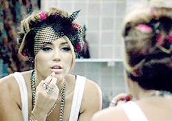 Image result for miley cyrus putting lipstick on gif